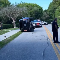 Tiger Woods arrested for suspected DUI after rolling his car