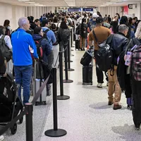 Airport security lines are long. Here's what to know if you're flying